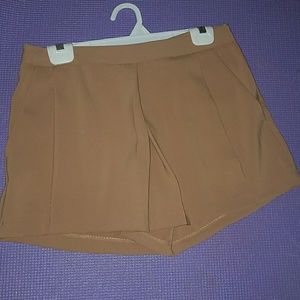 Tan pleated shorts